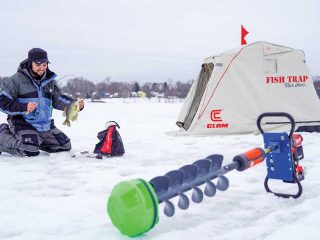 ice fisherman with crappie