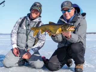 Chris Megan and Jon Peterson with lake trout
