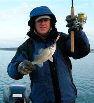Mid-winter white perch make are a fun reason to bundle up and hit the water.