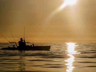 sunset kayak fishing