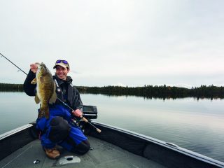 A winter smallmouth bass guide detailing the best places to find them at lakes, what lures to use, techniques, tackle, and more.